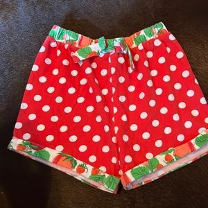 Red polka doted shorts with strawberry trim